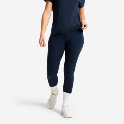 Legginsy sportowe damskie Domyos Essential. Niebieskie legginsy damskie DOMYOS, bez wzorów, z bawełny. Za 19.99 zł.