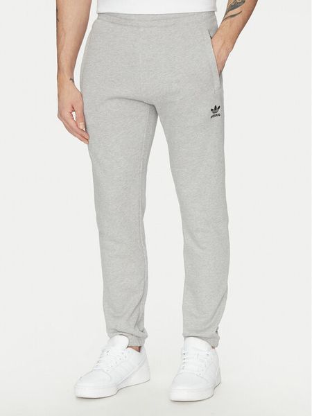 Adidas Spodnie dresowe Trefoil Essentials JD2424 Szary Slim Fit. Szare spodnie sportowe męskie Adidas, m, bez wzorów, z bawełny. Za 159.99 zł.