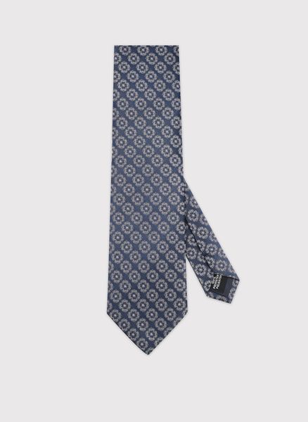 PAKO LORENTE – Granatowy krawat w kwiaty. Niebieskie krawaty i muchy Pako Lorente, bez wzorów, z poliesteru. Za 99.99 zł.