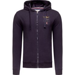 Bluza AERONAUTICA MILITARE. Niebieskie bluzy męskie Aeronautica Militare, bez wzorów, z dzianiny, z kapturem. W wyprzedaży za 528.00 zł.