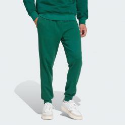 Spodnie Essentials Feel Cozy French Terry. Czarne spodnie sportowe męskie Adidas, m, bez wzorów, z dresówki, na fitness i siłownię. Za 219.00 zł.