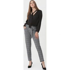 Czarne Spodnie Amalfi. Czarne spodnie materiałowe damskie Born2be, bez wzorów. Za 49.99 zł.