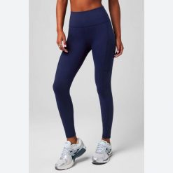 Damskie legginsy Fabletics On-The-Go. Niebieskie legginsy damskie FABLETICS, bez wzorów. Za 327.55 zł.