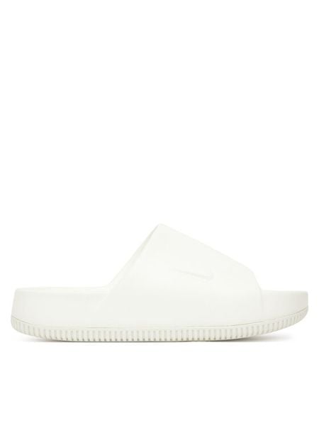 Nike Klapki Calm Slide DX4816 100 Biały. Białe klapki damskie Nike, bez wzorów, z tworzywa sztucznego, bez obcasa, bez zapięcia. Za 219.99 zł.