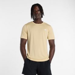 Koszulka męska New Balance MT61O0U4ABC – żółta. Żółte koszulki sportowe męskie New Balance, l, bez wzorów, z materiału, bez ramiączek, do biegania. Za 129.99 zł.