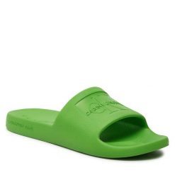 Klapki Calvin Klein Jeans. Zielone klapki damskie Calvin Klein Jeans, bez wzorów, z jeansu, bez obcasa, bez zapięcia. Za 109.99 zł.