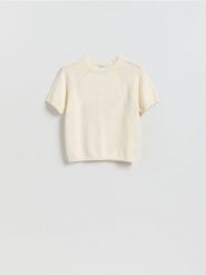 Bawełniany sweter - kremowy. Białe swetry nierozpinane damskie Reserved, l, bez wzorów, z bawełny, bez kołnierzyka, bez ramiączek. Za 109.99 zł.