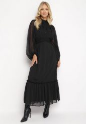 Czarna Rozkloszowana Sukienka Maxi z Falbanką Kamiva. Czarne sukienki damskie Born2be, s, z aplikacjami, bez kołnierzyka, bez ramiączek, maxi, rozkloszowane. Za 169.99 zł.