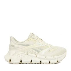 Buty do biegania Reebok. Białe obuwie sportowe damskie Reebok, bez wzorów, bez zapięcia, do biegania. Za 489.99 zł.