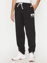 Champion Spodnie dresowe 220434 Czarny Loose Fit. Czarne spodnie sportowe męskie Champion, m, bez wzorów, z bawełny. Za 149.99 zł.