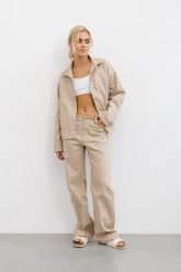 SPODNIE KAREN BEŻOWE M - Flawless. Brązowe spodnie sportowe damskie Flawless, bez wzorów, z bawełny, eleganckie, wspinaczkowe. Za 252.00 zł.