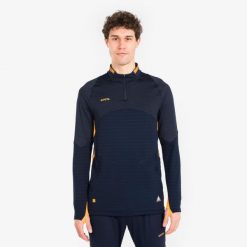 Bluza piłkarska Kipsta CLR na krótki suwak. Brązowe bluzy męskie KIPSTA, xl, bez wzorów, z materiału, sportowe, bez ramiączek, bez kaptura. Za 149.99 zł.