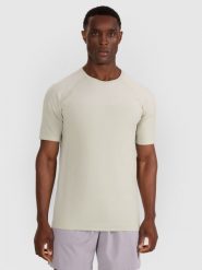 4F Koszulka treningowa bezszwowa męska - turkusowa L/XL. Niebieskie koszulki sportowe męskie 4F, l, bez wzorów, z materiału, bez kołnierzyka, bez ramiączek. Za 129.99 zł.