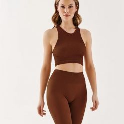 Bezszwowy top damski z dekoltem halter rib mocca. Brązowe koszulki sportowe damskie Gabriella, l, bez wzorów, z dzianiny, bez ramiączek. Za 69.60 zł.