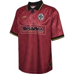 Koszulka Hummel Loose. Czerwone bluzki damskie Hummel, bez wzorów, sportowe, bez kołnierzyka, bez ramiączek. Za 244.50 zł.