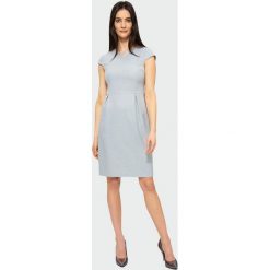Elegancka sukienka. Sukienki damskie Greenpoint, bez wzorów, z poliesteru, eleganckie, bez kołnierzyka, bez ramiączek. Za 89.99 zł.