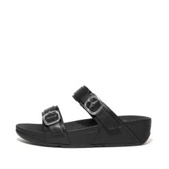 Kobiece klapki na koturnie FitFlop Lulu. Czarne klapki damskie FIT FLOP, bez wzorów, z materiału, eleganckie, bez obcasa, na koturnie, bez zapięcia. Za 534.50 zł.