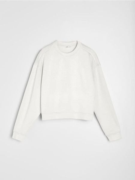 Bluza crewneck basic z dodatkiem wiskozy "soft touch" - kremowy. Białe bluzy damskie Sinsay, l, bez wzorów, z dzianiny, bez ramiączek, bez kaptura. Za 45.99 zł.