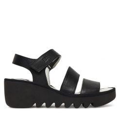 Sandały Fly London. Czarne sandały damskie Fly London, bez wzorów, bez obcasa, na koturnie, bez zapięcia. Za 547.99 zł.