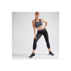 Legginsy 7/8 fitness kardio damskie 100 czarne. Czarne legginsy damskie DOMYOS, bez wzorów, z elastanu. Za 49.99 zł.