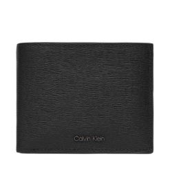 Portfel Calvin Klein. Czarne portfele męskie Calvin Klein, bez wzorów. Za 349.99 zł.