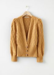 Sweter rozpinany z wysokim ściągaczem. Żółte kardigany damskie bonprix, bez wzorów, bez kołnierzyka. Za 147.99 zł.
