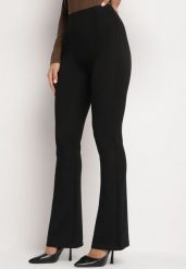 Czarne Spodnie z Bawełną i Wiskozą o Kroju Dzwonów z Wysokim Stanem i Gumką w Pasie Lertivra. Czarne spodnie materiałowe damskie Born2be, bez wzorów, z bawełny, biznesowe, z podwyższonym stanem. Za 79.99 zł.