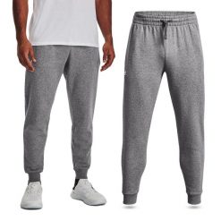 Spodnie dresowe męskie UNDER ARMOUR Rival Fleece joggery. Niebieskie spodnie sportowe męskie Under Armour, m, bez wzorów, z dresówki, na fitness i siłownię. Za 169.99 zł.