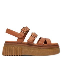 Sandały Clarks. Brązowe sandały damskie Clarks, bez wzorów, bez obcasa, na płaskiej podeszwie, bez zapięcia. Za 519.99 zł.