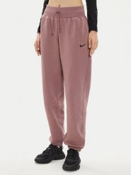 Nike Spodnie dresowe DQ5887 Różowy Oversize. Czerwone spodnie dresowe damskie Nike, bez wzorów, z bawełny. Za 209.99 zł.