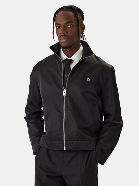 HUGO Kurtka przejściowa Bapono 50552664 Czarny Regular Fit. Czarne kurtki męskie Hugo, m, bez wzorów, z syntetyku, bez kaptura. Za 1,249.00 zł.