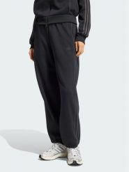 Adidas Spodnie dresowe Track KS4274 Czarny Regular Fit. Czarne spodnie dresowe damskie Adidas, bez wzorów, z dresówki. Za 329.99 zł.