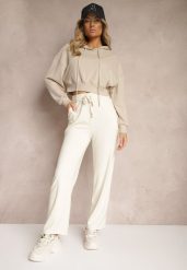 Jasnobeżowe Spodnie z Dodatkiem Wiskozy High Waist o Szerokim Kroju ze Sznurkami Isnia. Brązowe spodnie materiałowe damskie Renee, bez wzorów, z jeansu, eleganckie, z podwyższonym stanem. Za 44.99 zł.
