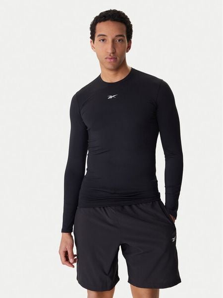 Reebok Koszulka techniczna RK25598CCM Czarny Slim Fit. Czarne koszulki sportowe męskie Reebok, m, bez wzorów, z syntetyku, bez ramiączek, na fitness i siłownię. Za 109.99 zł.