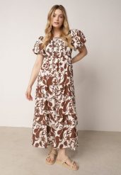 Brązowa Rozkloszowana Sukienka z Wiskozy z Bufiastymi Rękawami w Roślinny Wzór Semea. Brązowe sukienki damskie Born2be, do pracy, bez wzorów, z materiału, biznesowe, bez kołnierzyka, bez ramiączek, maxi, proste. Za 89.99 zł.