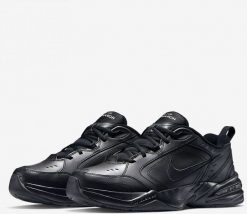 Nike Buty męskie Monarch IV czarne r. 43 (415445-001). Czarne buty sportowe męskie Nike, bez wzorów, bez zapięcia. Za 345.45 zł.