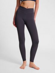 Damskie legginsy z wysokim stanem Hummel Wrap. Brązowe legginsy damskie Hummel, bez wzorów, z materiału. Za 203.45 zł.