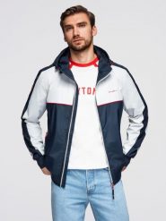 Męska kontrastowa kurtka wiatrówka z kapturem - granatowo-biała V1. Białe kurtki sportowe męskie Ombre Clothing, m, z aplikacjami, z gumy, z kapturem. Za 299.99 zł.