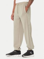 Guess Spodnie dresowe Z6BB03 K6544 Zielony Regular Fit. Zielone spodnie sportowe męskie Guess, l, z aplikacjami, z dresówki. Za 434.99 zł.