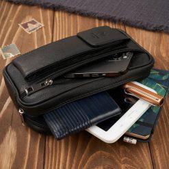 Paolo Peruzzi Saszetka męska skórzana do ręki z miejscem na telefon czarna T-132-BL. Czarne saszetki i nerki męskie Paolo Peruzzi, bez wzorów. Za 178.31 zł.