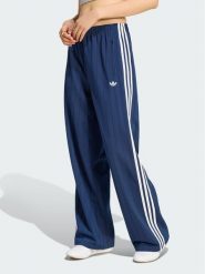 Adidas Spodnie dresowe Pinstripe Firebird Loose Trackpant KS9976 Granatowy Loose Fit. Niebieskie spodnie dresowe damskie Adidas, bez wzorów, z dresówki. Za 299.99 zł.