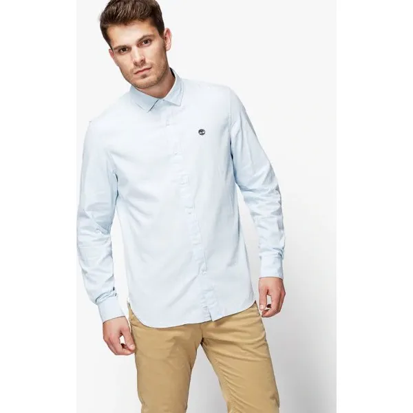 Timberland Koszula Ls Milford Solid Oxford Slim , niebieski, rozmiar L. Niebieskie koszule męskie Timberland, l, bez wzorów, z bawełny, klasyczne, bez kołnierzyka, bez ramiączek. W wyprzedaży za 259.99 zł.