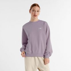Bluza damska New Balance WT41508ICW – różowa. Czerwone bluzy damskie New Balance, xl, bez wzorów, z bawełny, bez ramiączek, bez kaptura. Za 149.99 zł.
