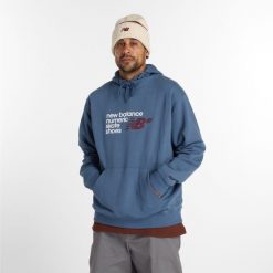 Bluza męska New Balance Numeric MT51954VTI – niebieska. Niebieskie bluzy męskie New Balance, m, z aplikacjami, z bawełny, z kapturem. Za 339.99 zł.