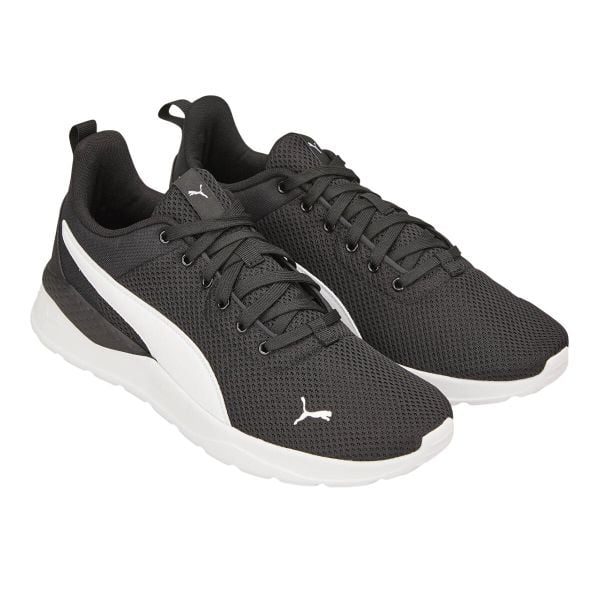 Trampki Unisex Dla Dorosłych Anzarun Lite. Białe trampki i tenisówki damskie Puma, bez wzorów, z gumy, bez zapięcia. Za 478.99 zł.