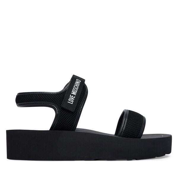 Sandały LOVE MOSCHINO. Czarne sandały damskie Love Moschino, bez wzorów, bez obcasa, na płaskiej podeszwie, bez zapięcia. Za 472.99 zł.