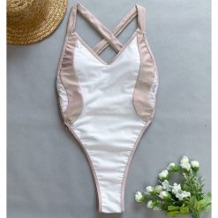 Strój kąpielowy jednoczęściowy z krzyżującymi ramiączkami odporny na chlor Otylie. Czerwone stroje kąpielowe damskie Intica, s, bez wzorów, z materiału. Za 159.00 zł.