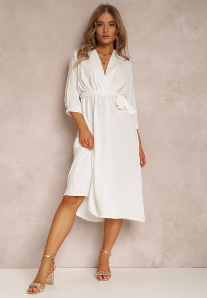 Biała Sukienka Canopis. Białe sukienki damskie Renee, m, bez wzorów, z materiału, eleganckie, bez kołnierzyka, bez ramiączek, midi, kopertowe. Za 89.99 zł.