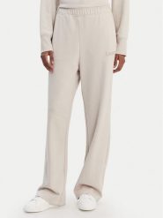 DKNY Sport Spodnie dresowe DP6P3795 Beżowy Regular Fit. Brązowe spodnie dresowe damskie DKNY Sport, bez wzorów, z bawełny, sportowe. Za 309.99 zł.