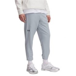 Spodnie treningowe męskie Under Armour Unstoppable Tapered. Niebieskie spodnie sportowe męskie Under Armour, m, bez wzorów, na fitness i siłownię. Za 249.99 zł.